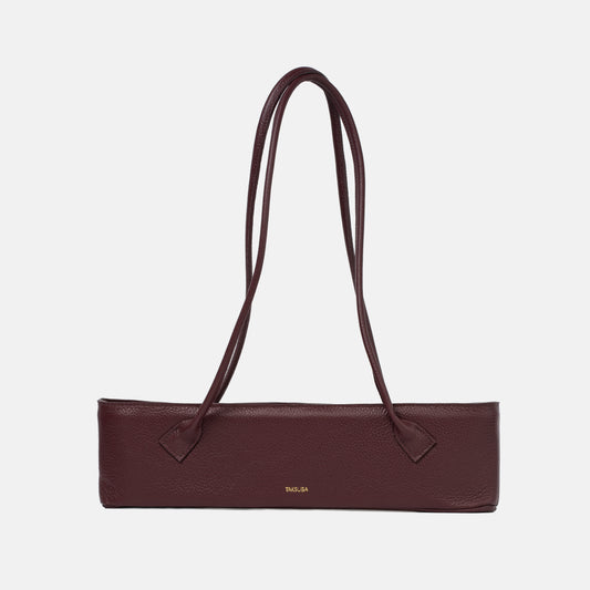 Torebka skórzana Teckelete w kolorze bordowym z długimi podwójnymi uchwytami i złotym logo marki Taksuba