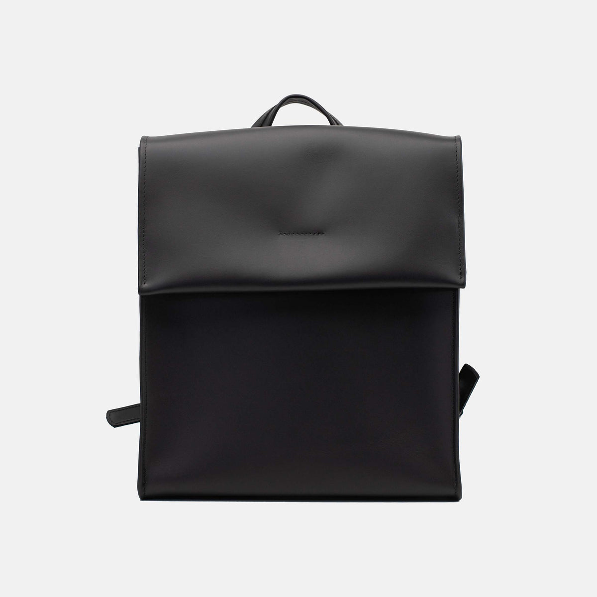 Medium smooth black leather backpack with a clean front flap and structured rectangular shape