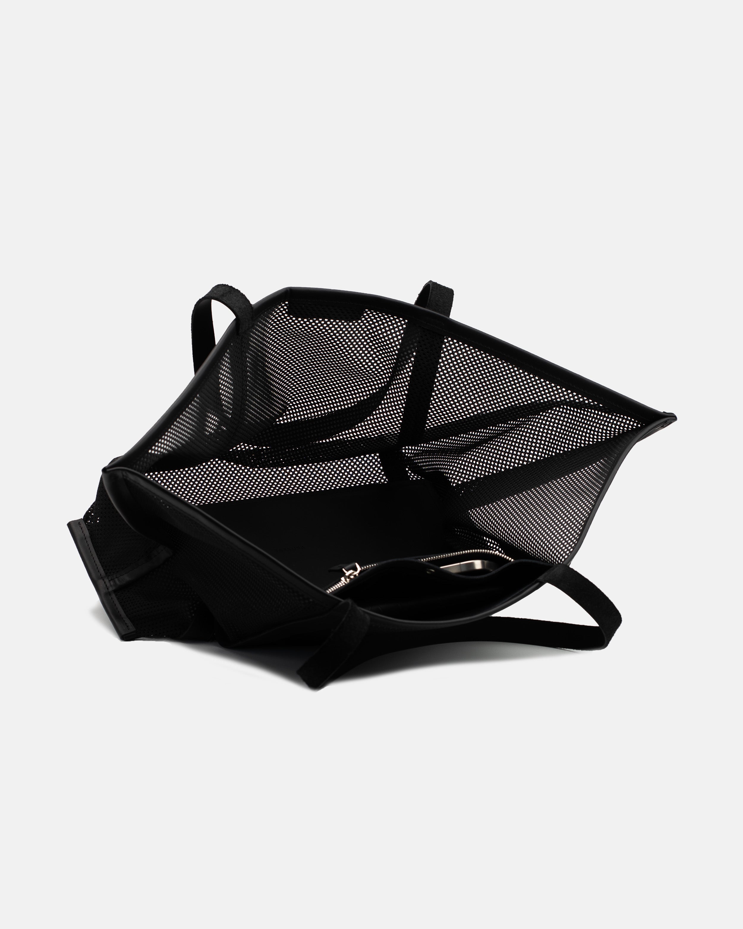 Open view of the black Astra Mesh shopper bag showing the spacious interior and mesh side panels