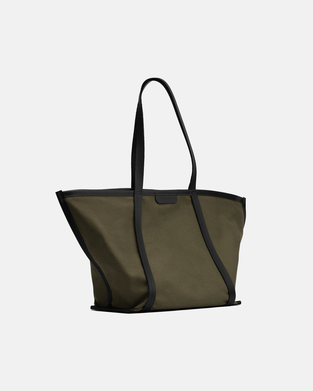 Angled view of Astra Shopper Canvas olive tote bag with black leather details, shoulder straps, and structured base