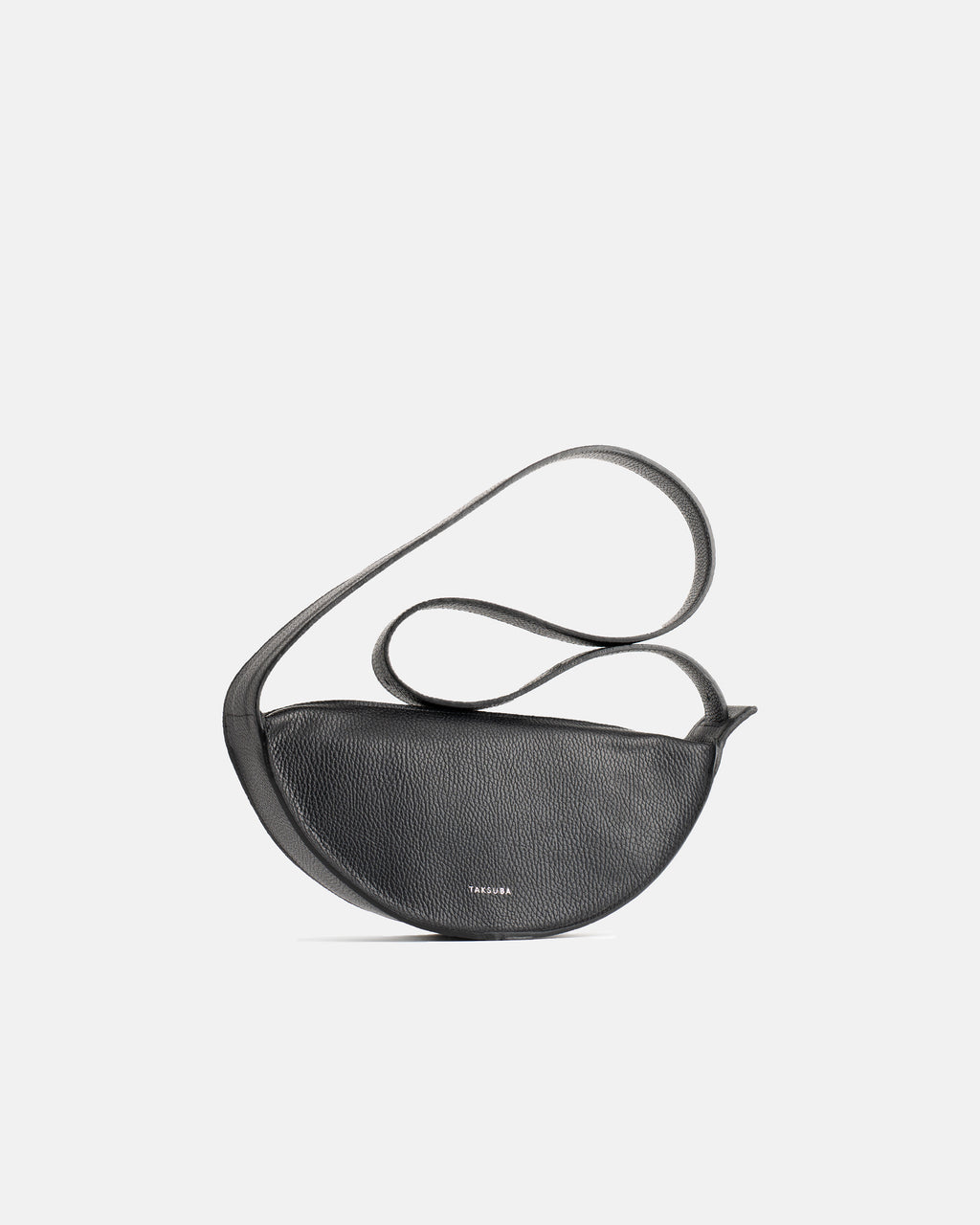 Black Eclipse M leather handbag with crescent shape and shoulder strap arranged above