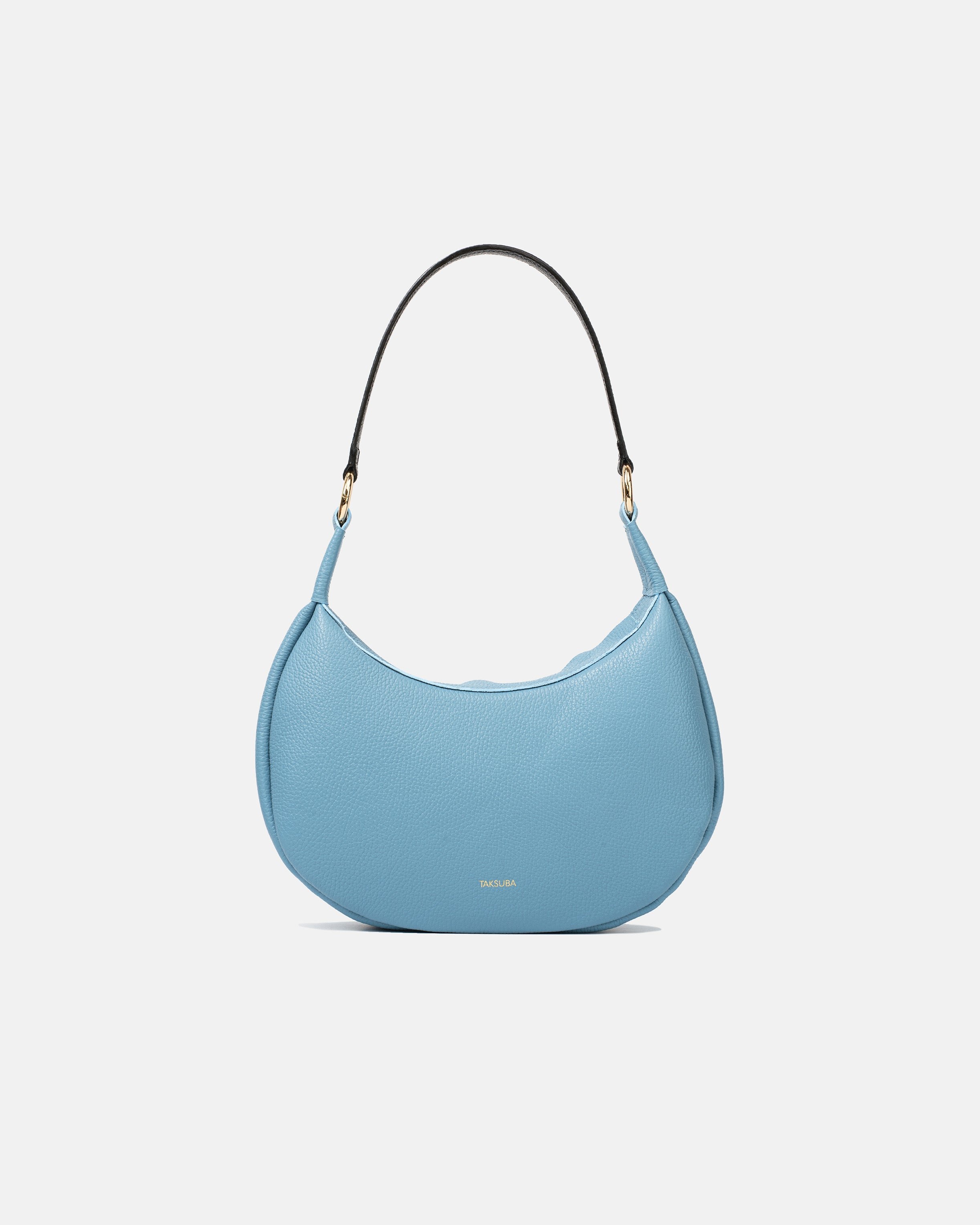 Blue Hedera leather handbag with black shoulder strap and gold-tone hardware