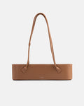 Brown Teckelete leather handbag with elongated body and long shoulder handles