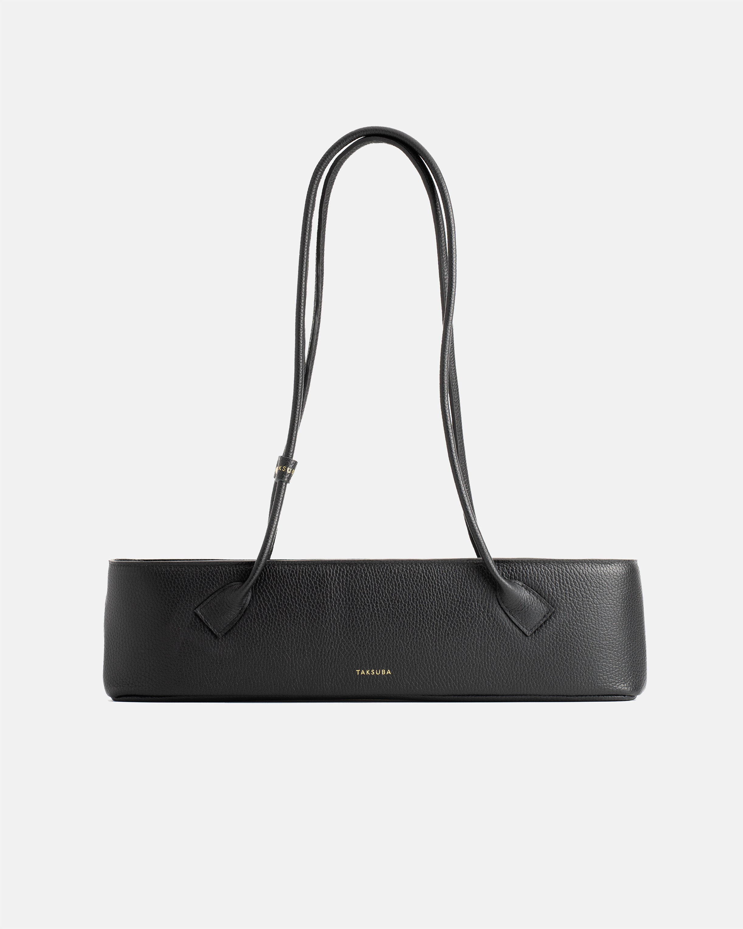 Czarna skórzana torebka Teckelete na ramię, w wydłużonym poziomym fasonie