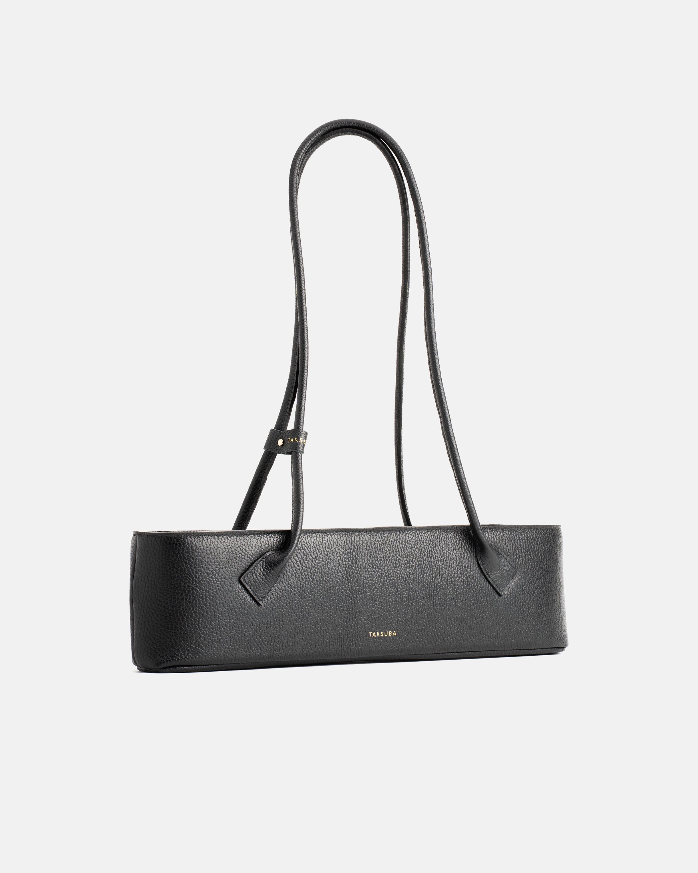 Czarna skórzana torebka Teckelete na ramię, o wydłużonym fasonie