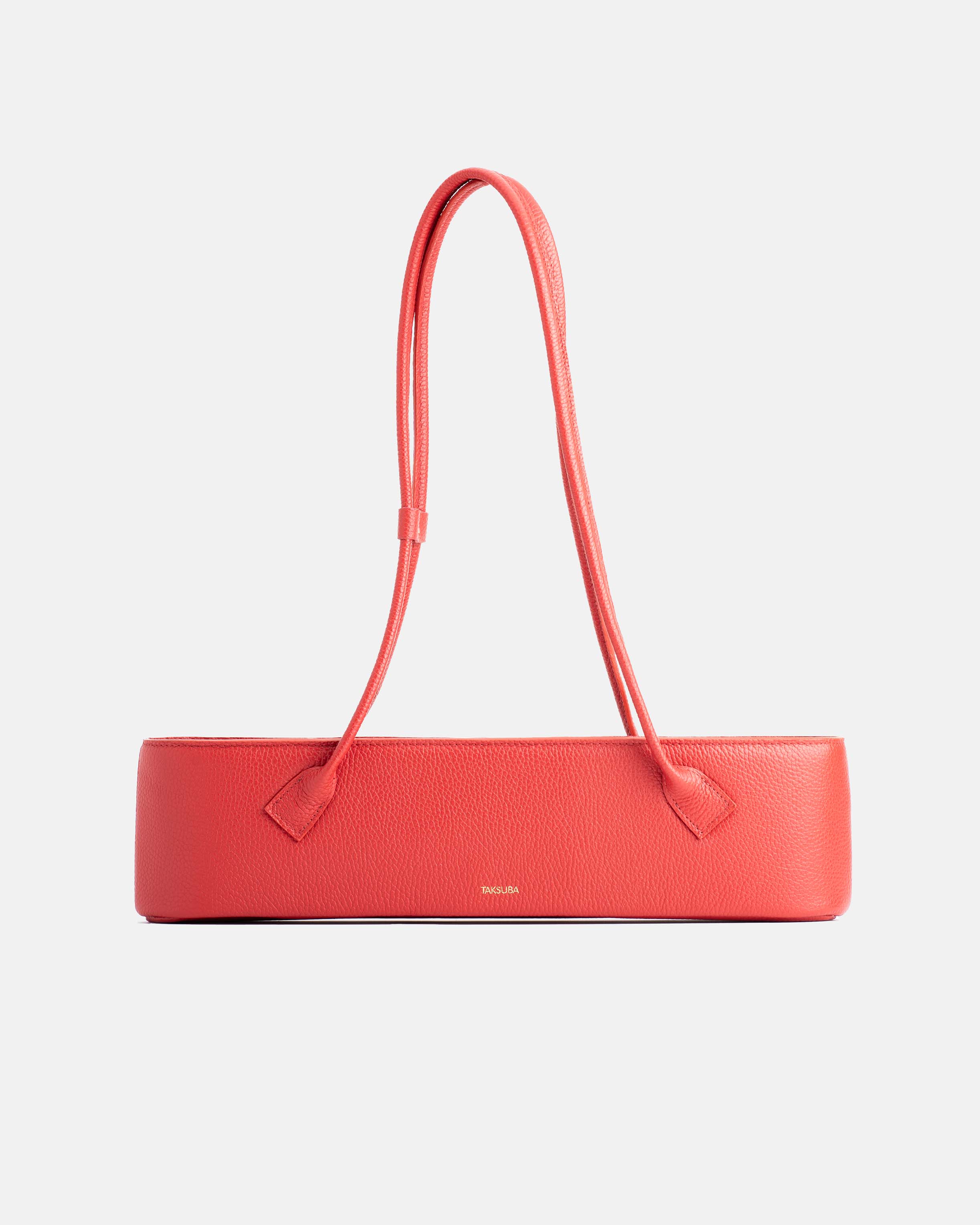 Koralowa skórzana torebka Teckelete na ramię, w wydłużonym poziomym fasonie