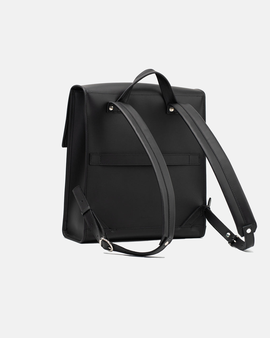 Rear view of the medium black leather backpack with shoulder straps and horizontal luggage strap