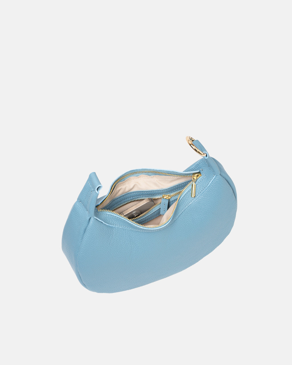 Wewnętrzny widok otwartej niebieskiej skórzanej torebki damskiej z metalowym zamkiem błyskawicznym, pokazujący przegrodę na telefon i dodatkowe kieszonki