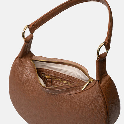 Brązowa skórzana torebka Hedera TAKSUBA z otwartą górą, widoczna jasna podszewka i wewnętrzna kieszeń na zamek