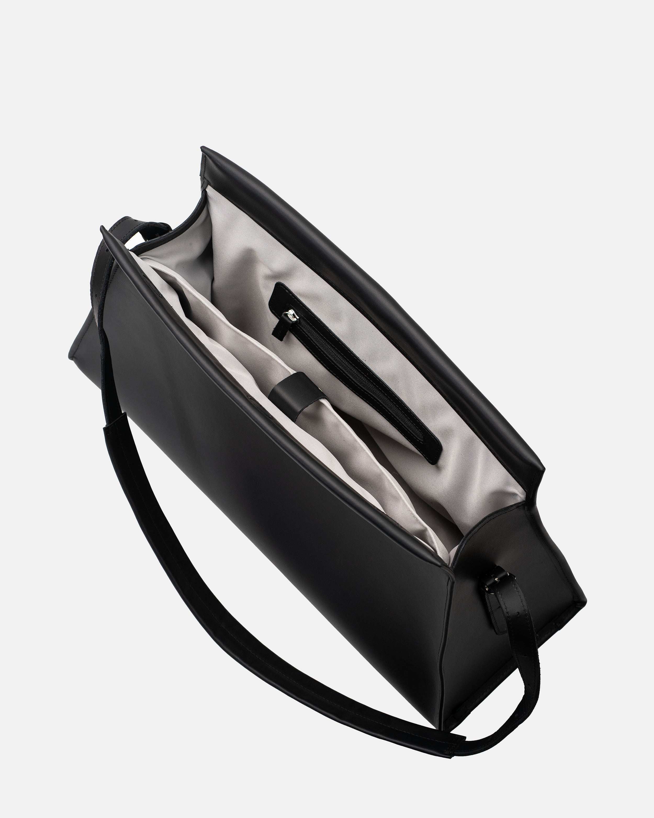 Vela black leather shoulder bag open interior with pockets and zip compartment