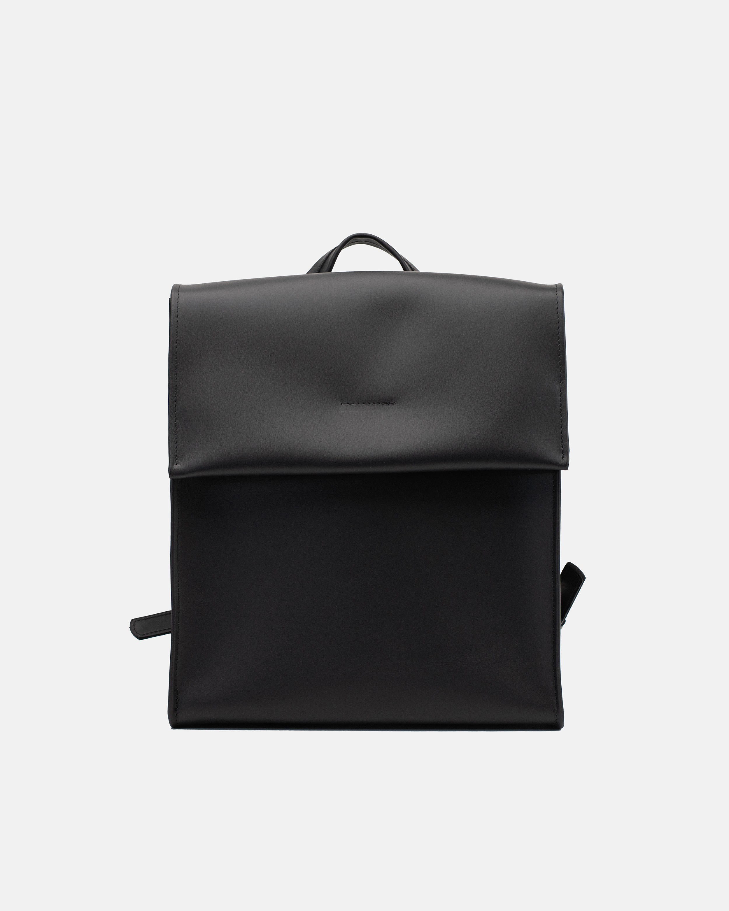 Medium smooth black leather backpack with a clean front flap and structured rectangular shape